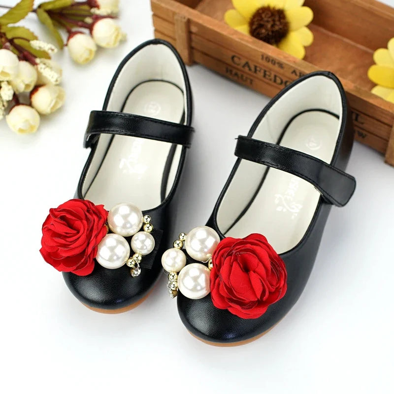 A pair of children's shoes in a unique and stylish Korean-inspired design, featuring a microfiber leather upper and a comfortable, durable beef tendon sole.
