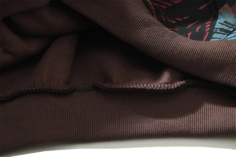 High Street men's and women's casual loose sweater in coffee colour, featuring a soft, velvet-like texture and a contemporary loose fit