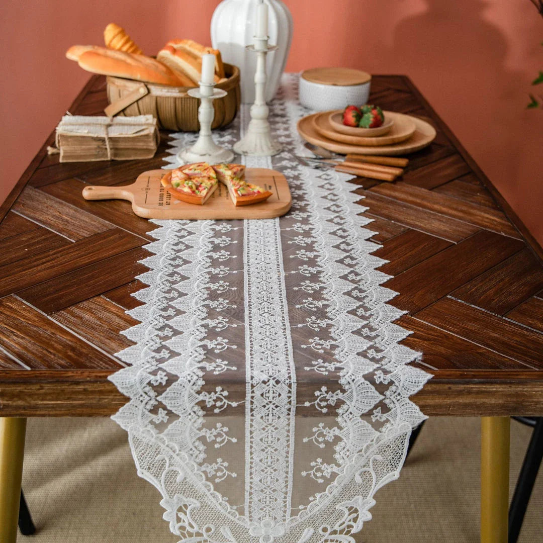 Elegant lace table runner with intricate embroidered patterns and hollowed-out design