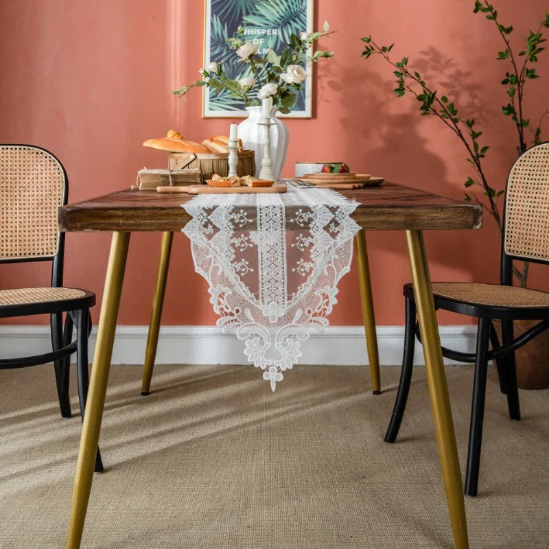 Elegant lace table runner with intricate embroidered patterns and hollowed-out design