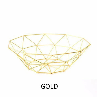 Wrought iron storage basket in black, gold, and rose gold colors, featuring a round, industrial-inspired design for versatile home organisation.