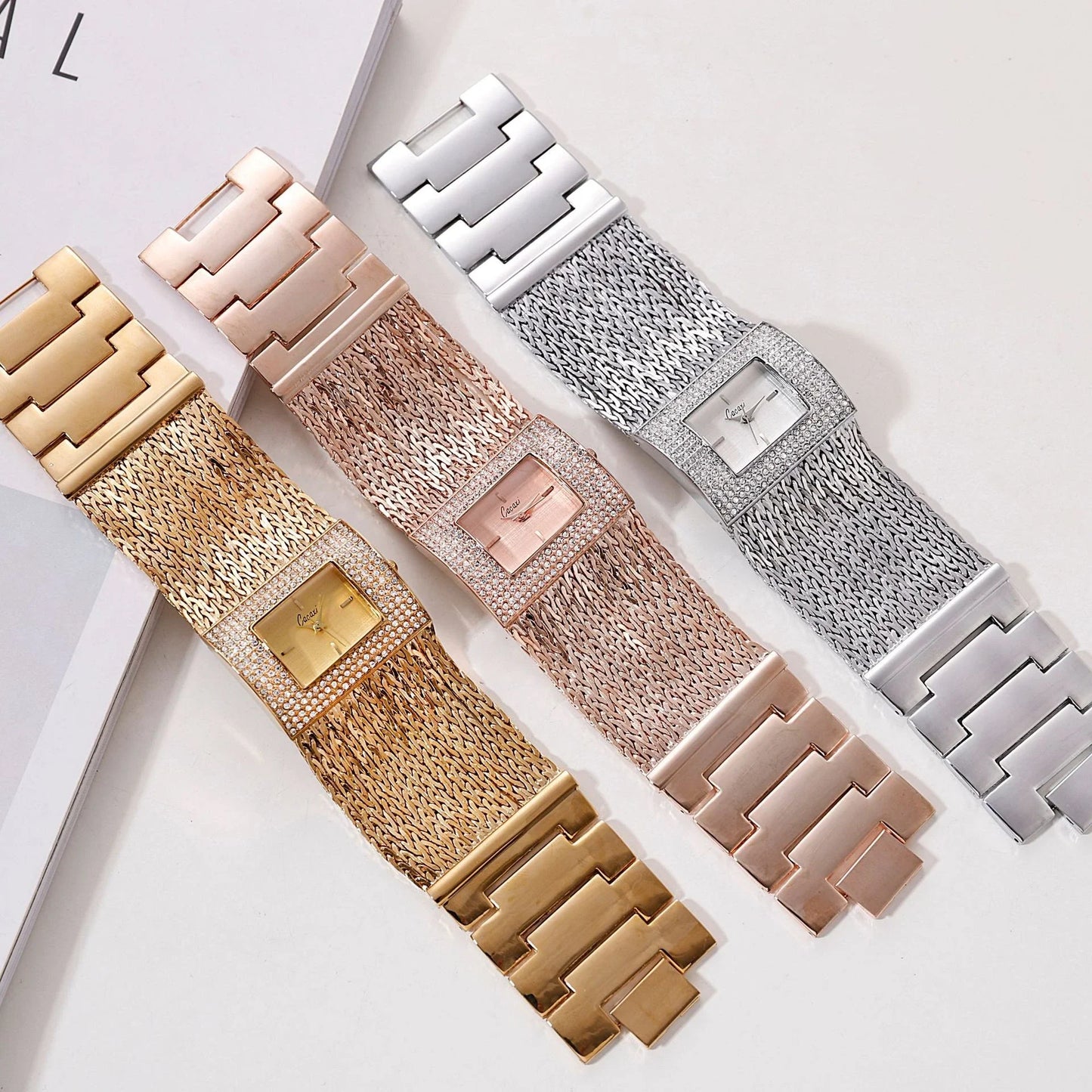 Ladies Gold Quartz Square Chain Rhinestone Watch with a sparkling rhinestone-encrusted face and a durable alloy chain