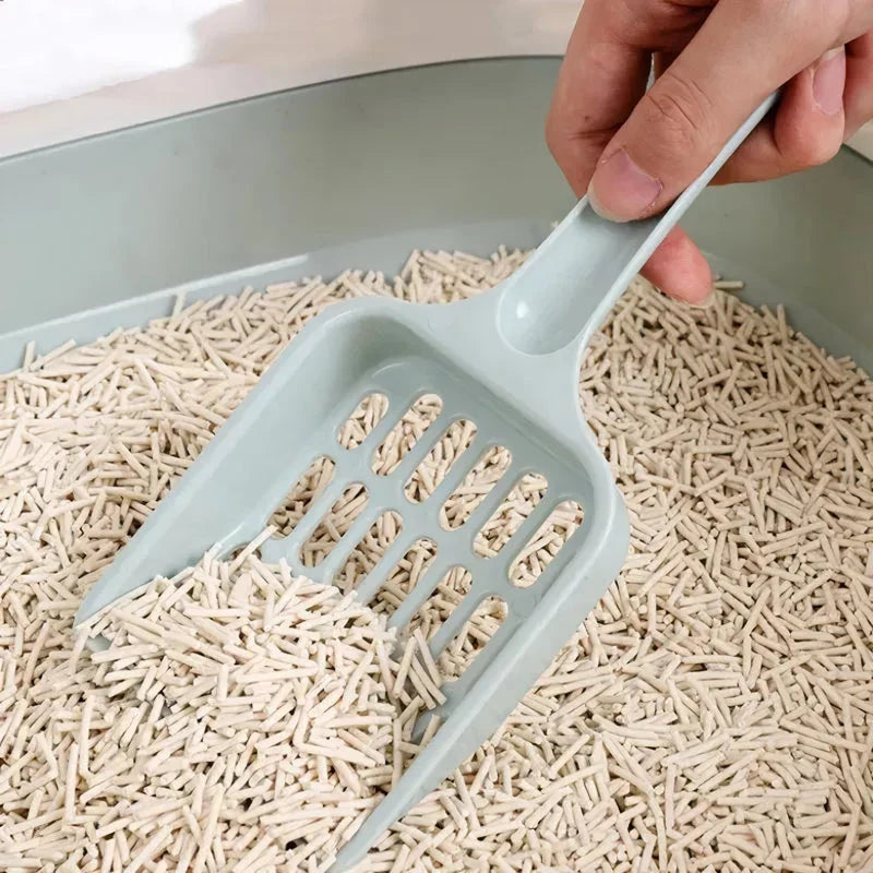 A large, high-quality cat litter scoop with a perforated design and ergonomic handle for efficient and comfortable litter box cleaning