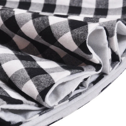 Black and white plaid Christmas tree skirt with a classic, elegant design