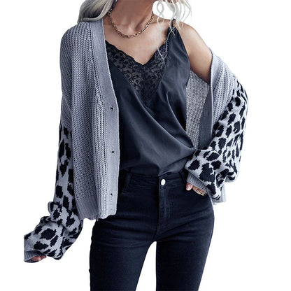 A stylish leopard print sweater coat with long sleeves and a classic design, perfect for autumn and winter in the UK.