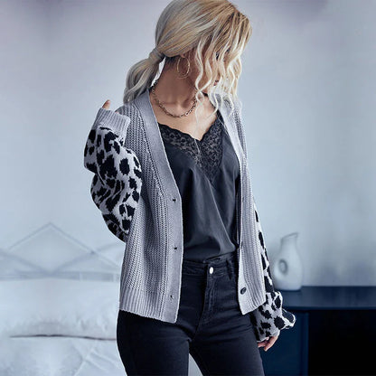 A stylish leopard print sweater coat with long sleeves and a classic design, perfect for autumn and winter in the UK.