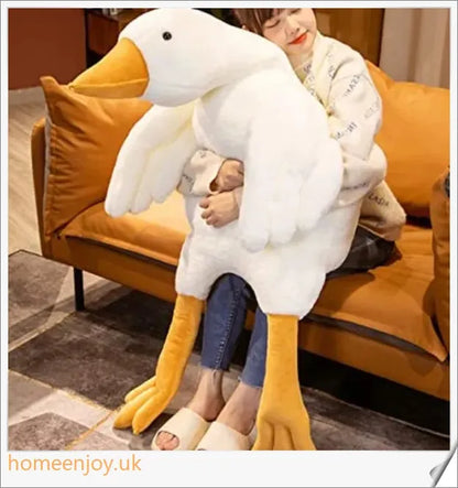Soft and cuddly Bruce The Goose plush toy in various sizes, featuring a realistic and adorable design for comfort and relaxation