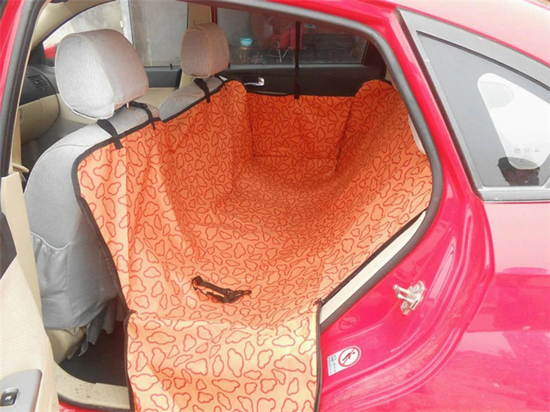 Durable, eco-friendly car back seat cover mat for pets, protecting vehicle upholstery and providing comfort for dogs during travels in the UK.