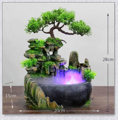 A beautiful resin tabletop fountain with flowing water, mimicking a river down a mountainside.