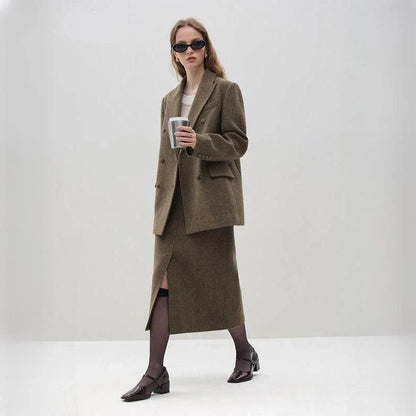 Elegant wool blazer skirt set for professional and formal wear, featuring a double-breasted jacket and a front-split long skirt in a sophisticated solid pattern.