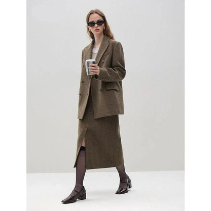 Elegant wool blazer skirt set for professional and formal wear, featuring a double-breasted jacket and a front-split long skirt in a sophisticated solid pattern.