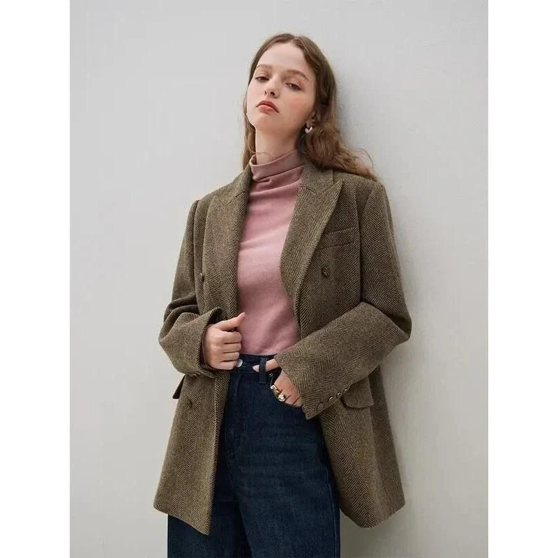 Elegant wool blazer skirt set for professional and formal wear, featuring a double-breasted jacket and a front-split long skirt in a sophisticated solid pattern.
