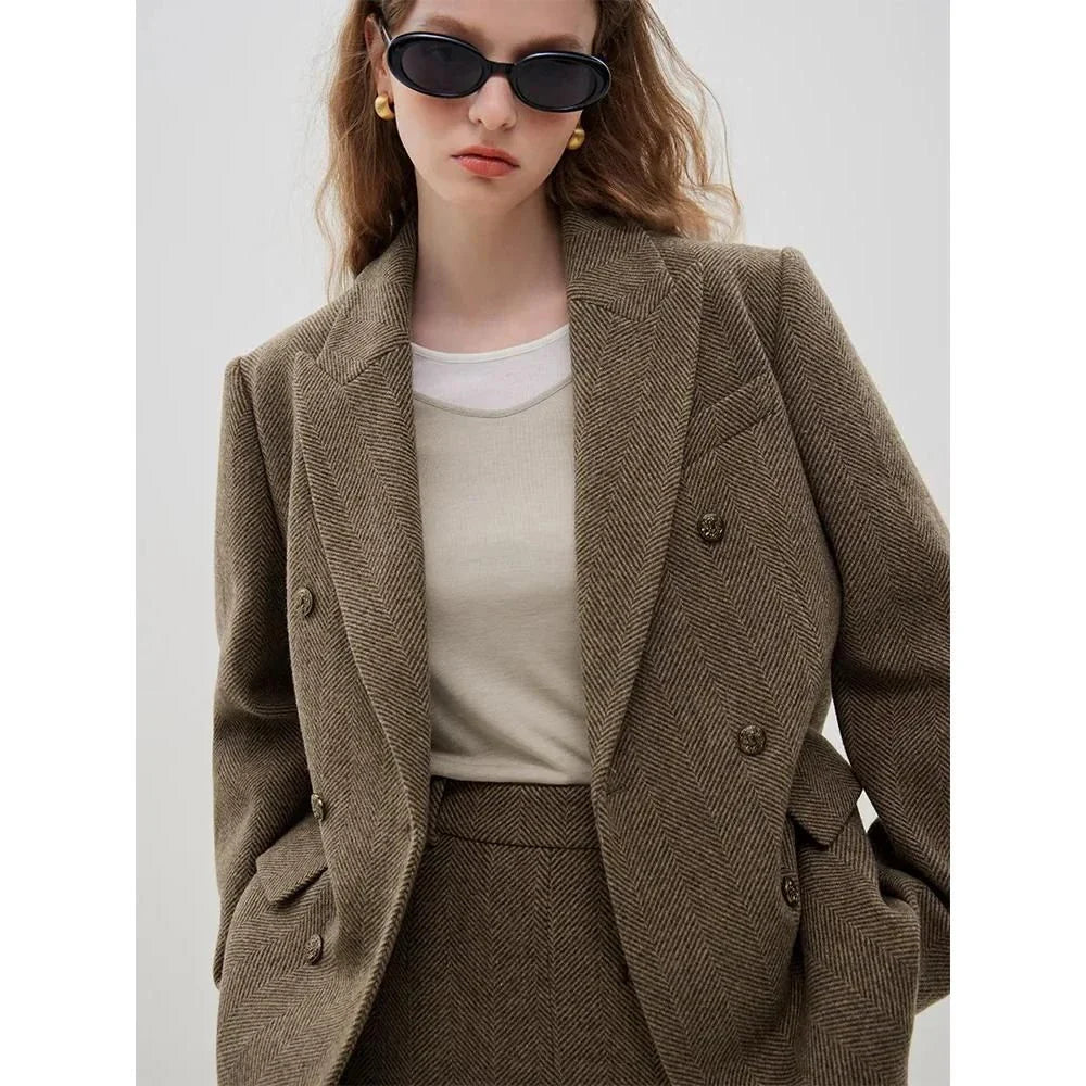 Elegant wool blazer skirt set for professional and formal wear, featuring a double-breasted jacket and a front-split long skirt in a sophisticated solid pattern.