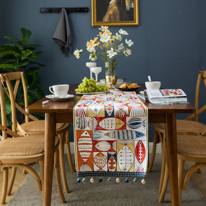 A festive jacquard table runner featuring a vibrant fish design, perfect for adding a touch of charm to your dining and home decor.