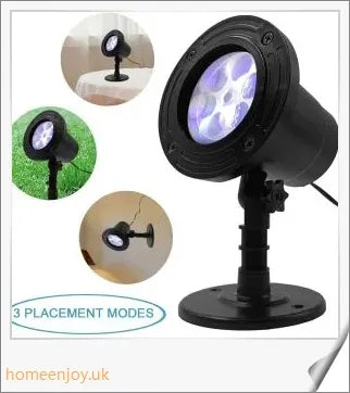 Christmas Falling Snow Flake LED Light Projector creating a snowy scene in a backyard or garden