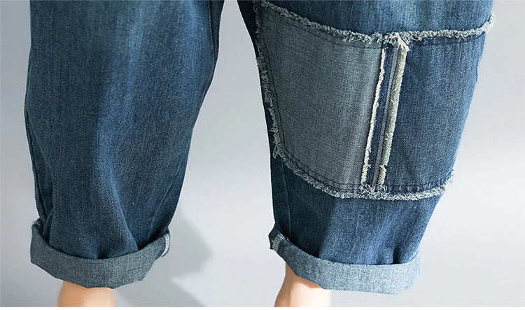 Casual literary women's plus size denim overalls with a high-waisted design and distressed accents for a stylish, comfortable look.