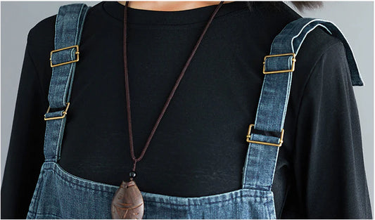 Casual literary women's plus size denim overalls with a high-waisted design and distressed accents for a stylish, comfortable look.