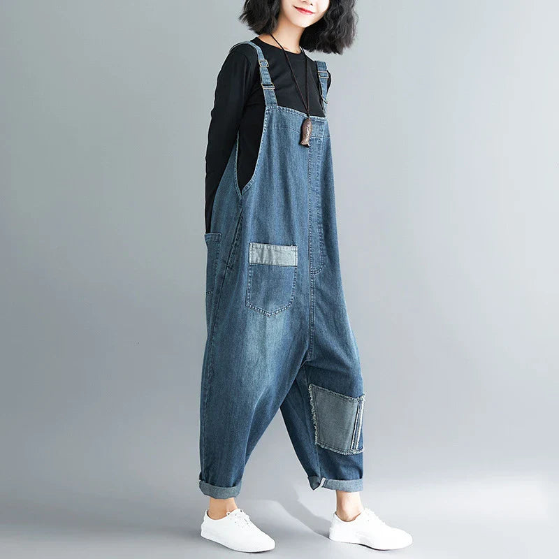 Casual literary women's plus size denim overalls with a high-waisted design and distressed accents for a stylish, comfortable look.