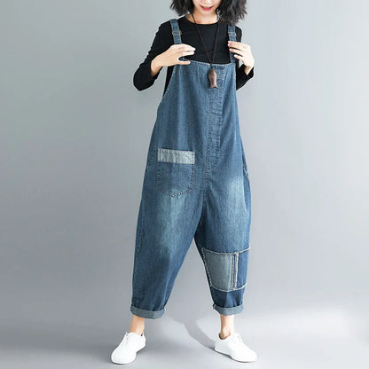 Casual literary women's plus size denim overalls with a high-waisted design and distressed accents for a stylish, comfortable look.
