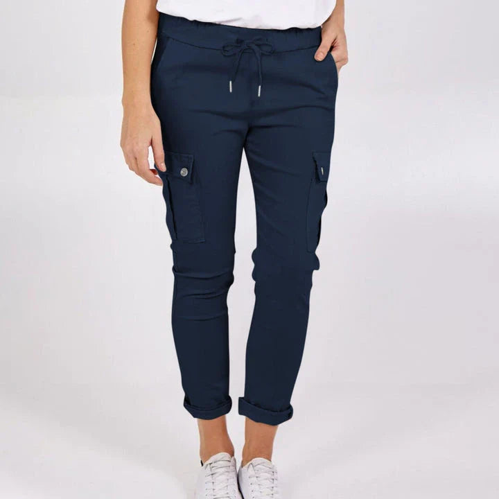 Women wearing casual cargo trousers with pockets in a solid colour and drawstring waist