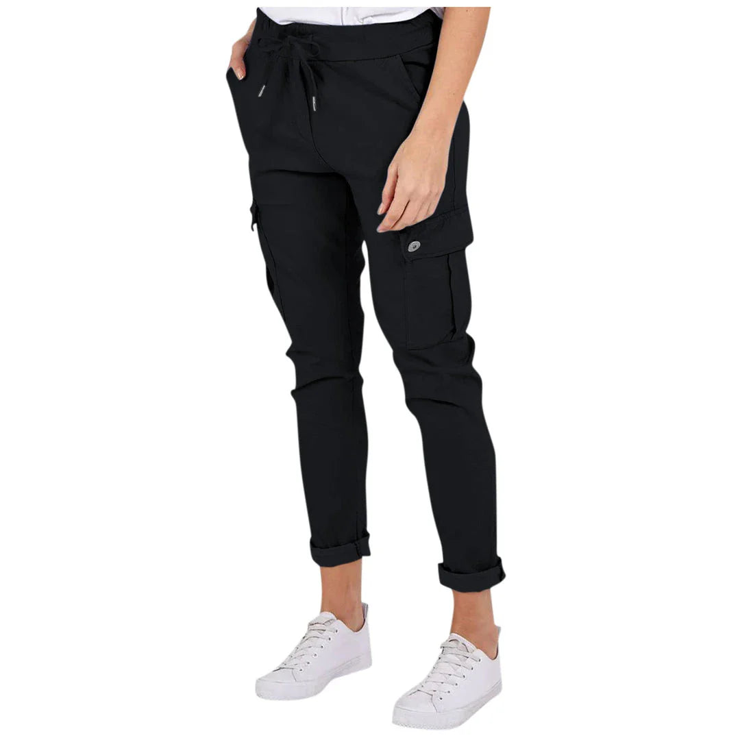 Women wearing casual cargo trousers with pockets in a solid colour and drawstring waist