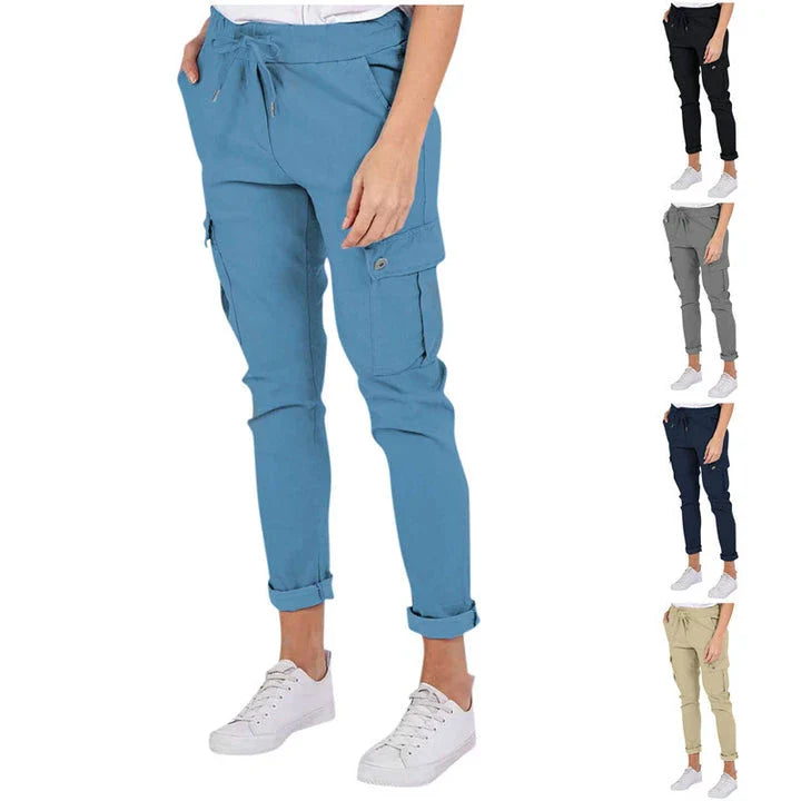 Women wearing casual cargo trousers with pockets in a solid colour and drawstring waist
