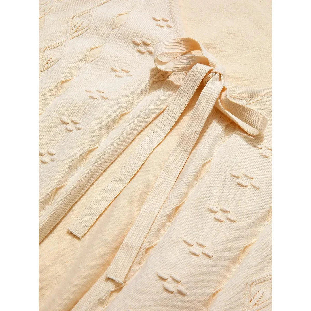 Apricot Elegant V-Neck French Style Knit Cardigan with delicate bow detail and jacquard pattern