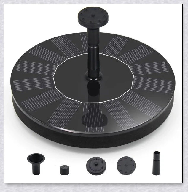 Solar-powered bird bath water fountain pump in a garden or pond setting, creating a relaxing display of water