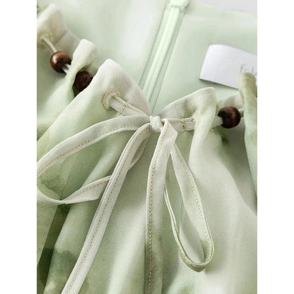 Elegant Chinese-inspired dress with a romantic, sophisticated design in creamy-white colour