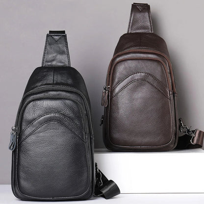 Premium genuine leather crossbody bag in black with multiple internal compartments and adjustable strap for versatile everyday wear