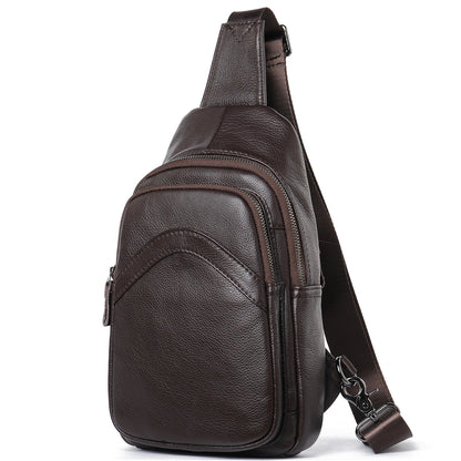 Premium genuine leather crossbody bag in black with multiple internal compartments and adjustable strap for versatile everyday wear
