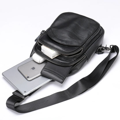 Premium genuine leather crossbody bag in black with multiple internal compartments and adjustable strap for versatile everyday wear