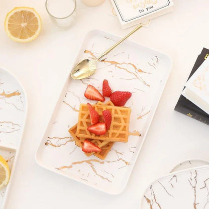 Elegant marble ceramic plate with a sophisticated and timeless design, perfect for dining and entertaining.