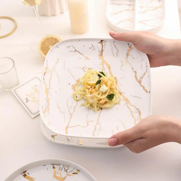 Elegant marble ceramic plate with a sophisticated and timeless design, perfect for dining and entertaining.