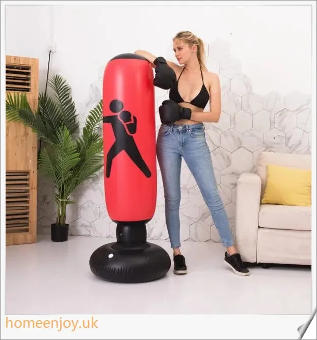 Inflatable boxing punching bag with sturdy stand and sandbag base for stable, durable home workouts