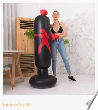 Inflatable boxing punching bag with sturdy stand and sandbag base for stable, durable home workouts