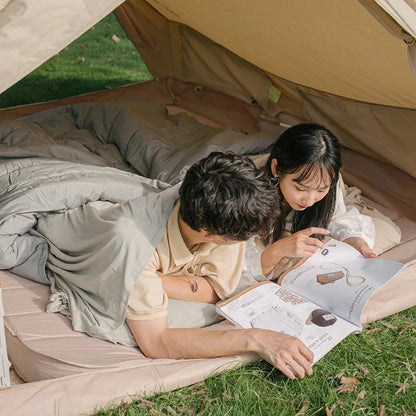 Premium cotton sleeping bag liner in green, featuring a soft, breathable, and comfortable design for travel and camping