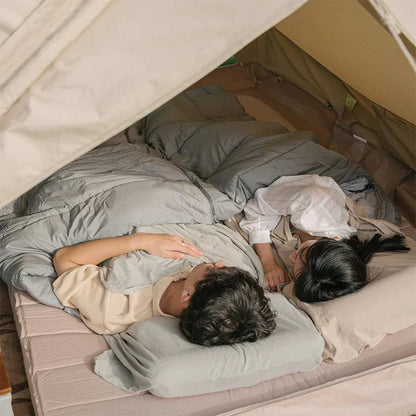 Premium cotton sleeping bag liner in green, featuring a soft, breathable, and comfortable design for travel and camping