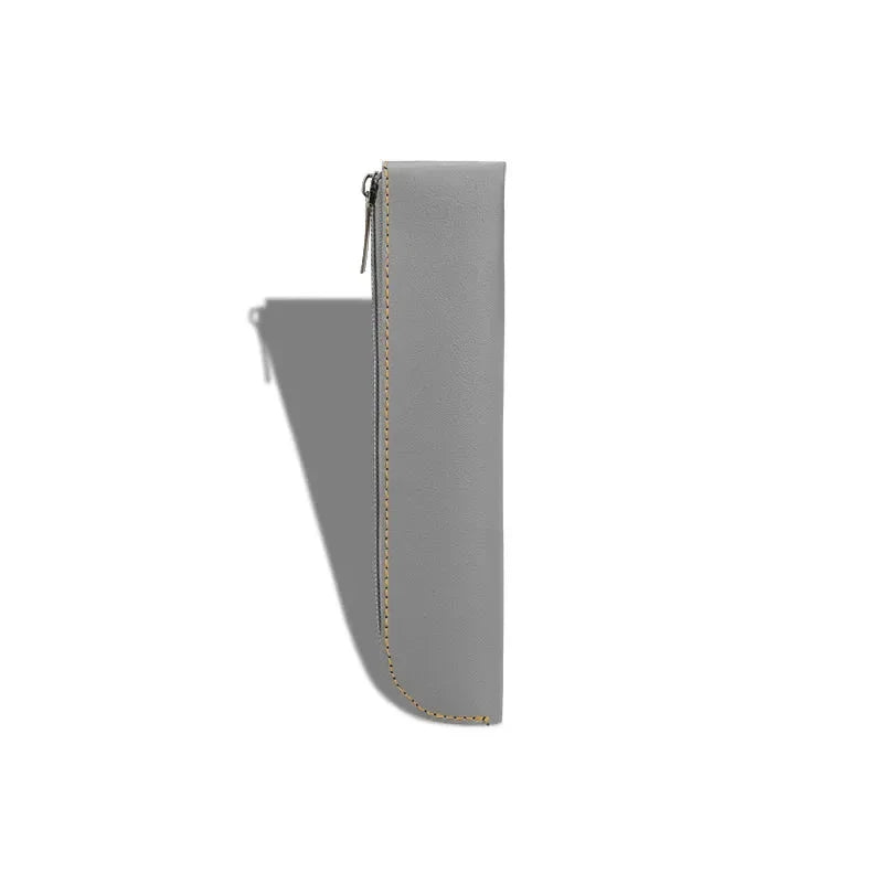 A sleek and sophisticated PU leather pencil case with a secure zipper closure, perfect for organising writing essentials for school and office use.