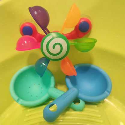 Colourful children's water wheel bath toy with spinning rainbow-coloured waterwheels