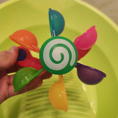 Colourful children's water wheel bath toy with spinning rainbow-coloured waterwheels