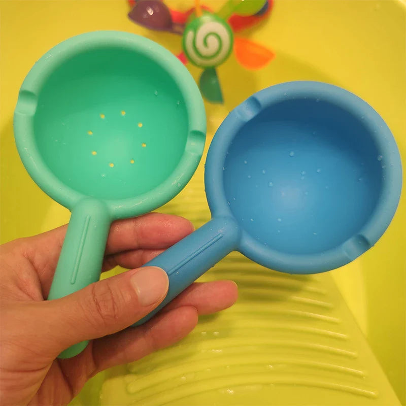 Colourful children's water wheel bath toy with spinning rainbow-coloured waterwheels