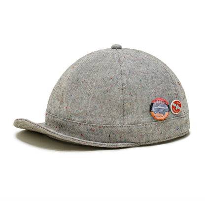 A stylish flat brim peaked cap made of premium polyester fiber, perfect for any season in the UK.