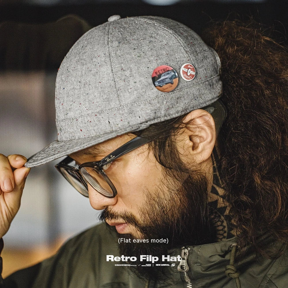 A stylish flat brim peaked cap made of premium polyester fiber, perfect for any season in the UK.