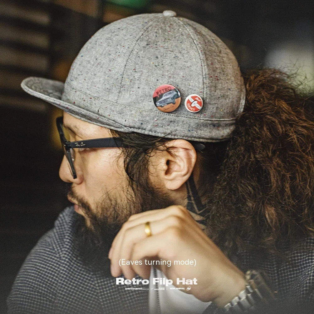 A stylish flat brim peaked cap made of premium polyester fiber, perfect for any season in the UK.