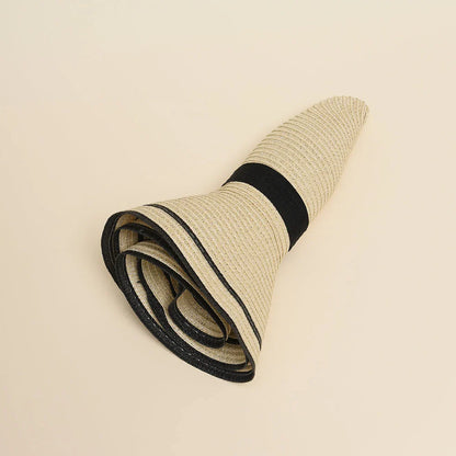 A stylish bowknot straw sun hat providing excellent UV protection and comfort for summer adventures