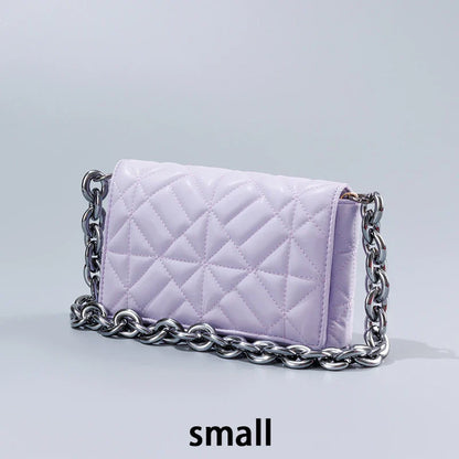 Lingge Small Bag in pink with a large gold chain, a stylish one-shoulder crossbody bag with a quilted design.