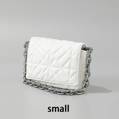Lingge Small Bag in pink with a large gold chain, a stylish one-shoulder crossbody bag with a quilted design.