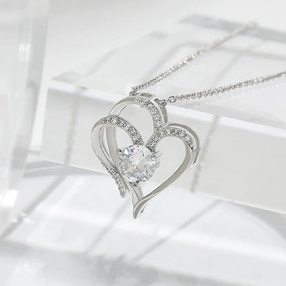Heart-shaped pendant necklace with sparkling rhinestones, a stylish and elegant accessory for women