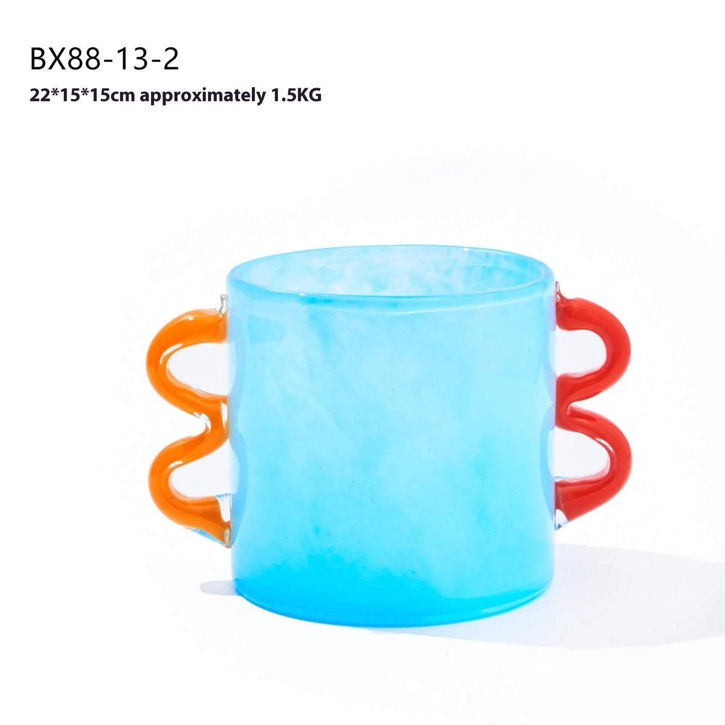 Handmade straight glass vase with a gradient colour effect and polished surface in a Nordic modern style.